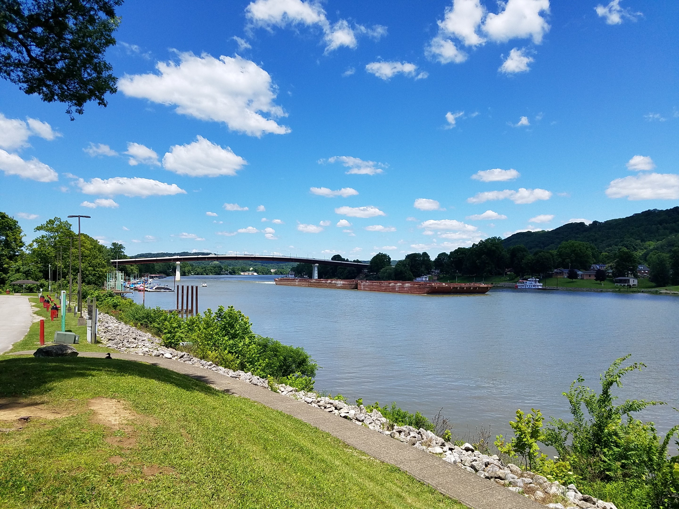 Coal barges traveling down the Kanawha River next to the St. Albans Roadside Park