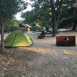 Our campsite with our food storage and conveniently located bathroom to the upper left