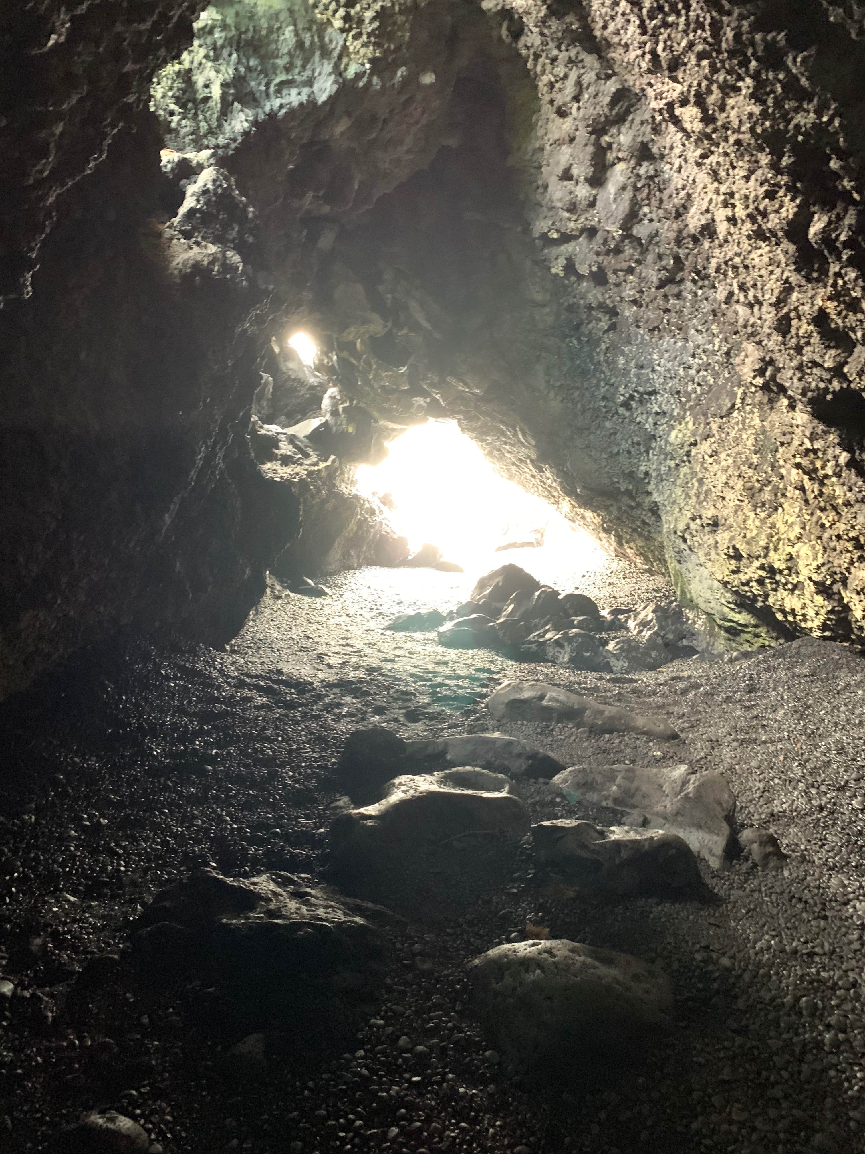the lava tube/cave at the black sand beach