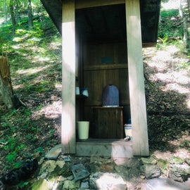 Open air outhouse