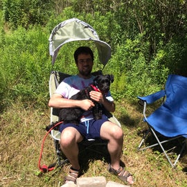 Dylan and Ollie enjoying the GCI Outdoor Pod Rocker with SunShade