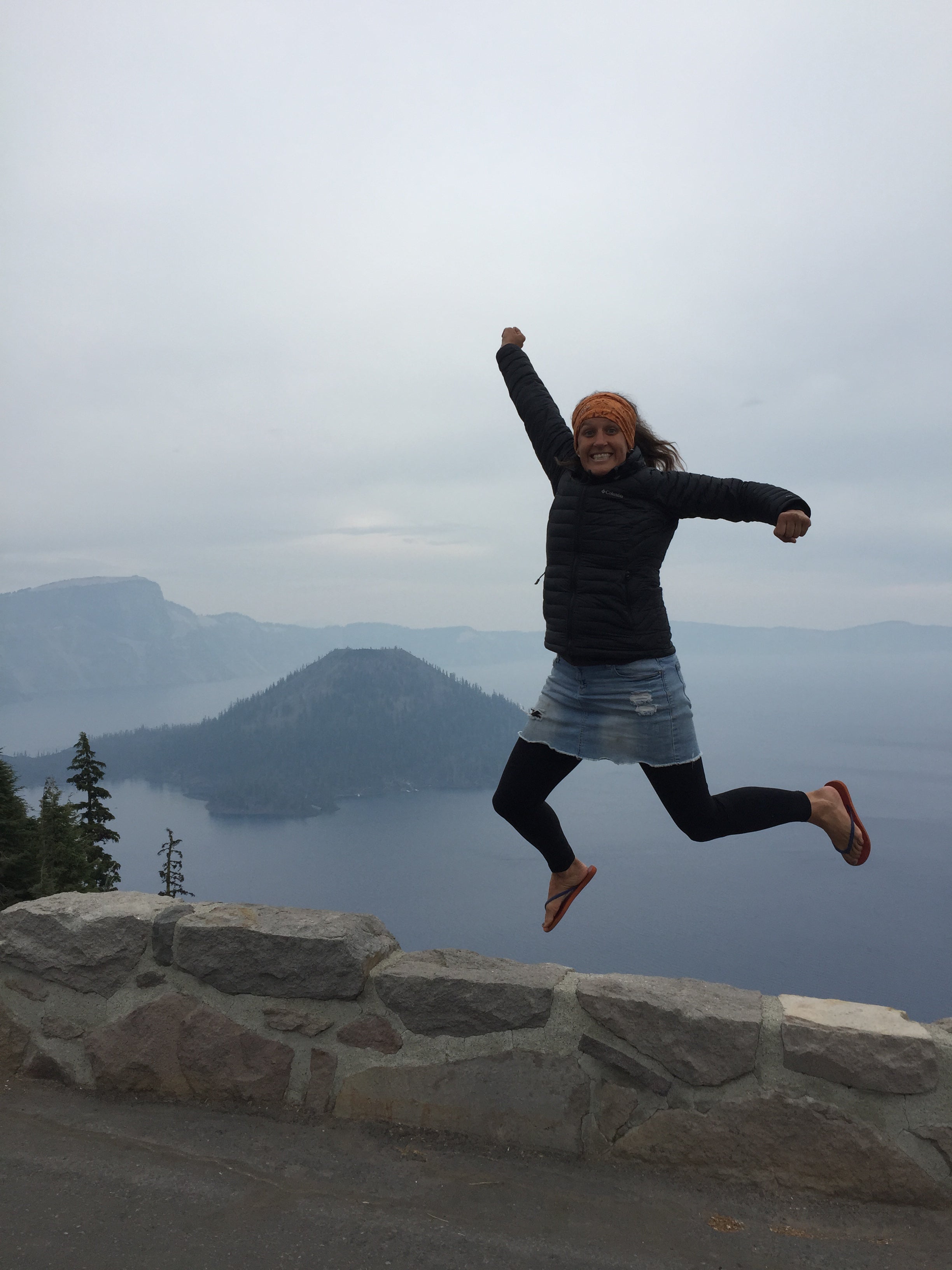 Jumping for joy over the smoke filled crater lake (before I found out we didn't have a place to sleep)
