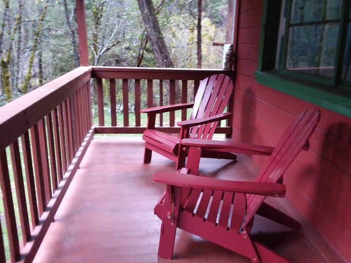 Front porch and two red Adirondack of red cabin.



Enjoy sitting out under covering on the front porch of the historic Forest Glen Guard Station.

Credit: Corinne Corson, US Forest Service
