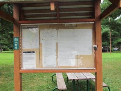 Campground rules and information kiosk next to parking lot

Information kiosk - check here for rules and alerts

Credit: GNMP