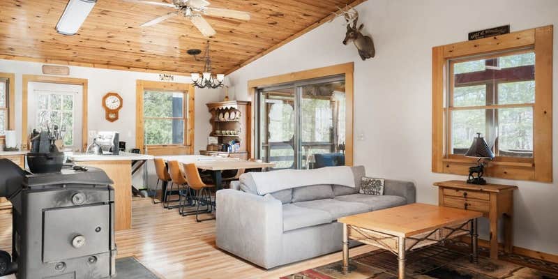 Camper submitted image from Cabin w New Hot Tub, River/Kayak, WiFi, & Fire Pit