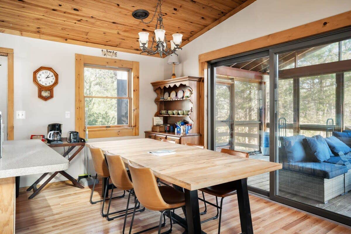 Camper submitted image from Cabin w New Hot Tub, River/Kayak, WiFi, & Fire Pit - 2