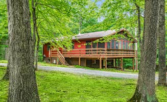 The Dyrt's photo of a cabin at Cabin w New Hot Tub, River/Kayak, WiFi, & Fire Pit near Burlington, WV