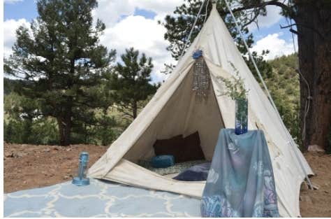 Ida S.'s photo of tent camping at MountainAirNMe near Howard, CO