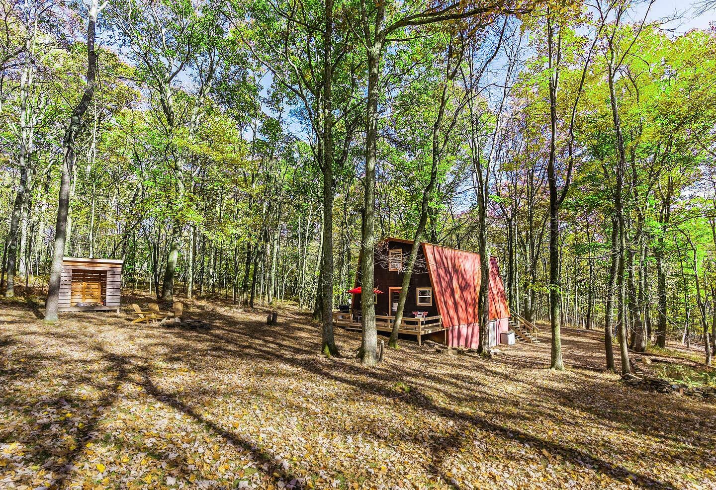 The Dyrt's photo of a cabin at Private Lake/Beach w Golf, Fire Pit, Deck & WiFi! near Farmington, PA