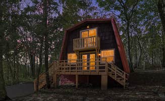 The Dyrt's photo of a cabin at Private Lake/Beach w Golf, Fire Pit, Deck & WiFi! near Burlington, WV