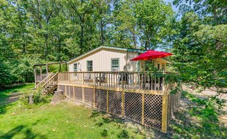 The Dyrt's photo of a cabin at River Access Cabin w Hot Tub, Deck, Grill, & Wifi near Syria, VA