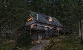 The Dyrt's photo of a cabin at Hot Tub, Wraparound Deck, & WiFi at Chalet Cabin near Ranson, WV