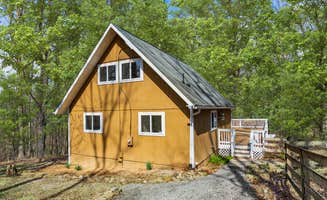 The Dyrt's photo of a cabin at Hot Tub, Fire Pit, Deck, Grill, WiFi, Dog-Friendly near Ranson, WV