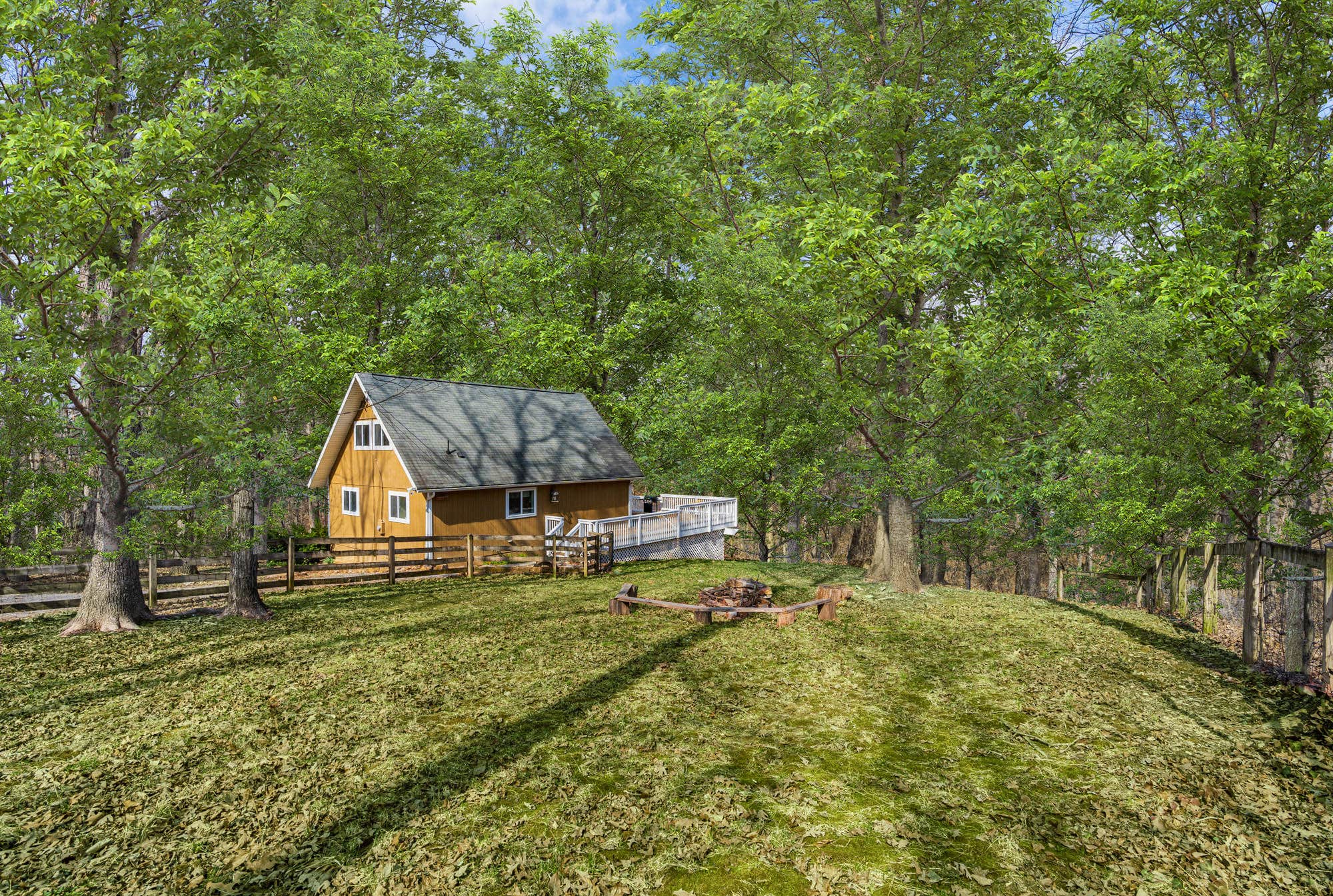 The Dyrt's photo of a cabin at Hot Tub, Fire Pit, Deck, Grill, WiFi, Dog-Friendly near Hedgesville, WV