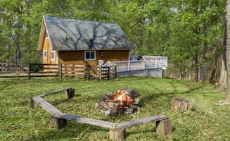 The Dyrt's photo of a cabin at Hot Tub, Fire Pit, Deck, Grill, WiFi, Dog-Friendly near Boyce, VA