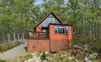The Dyrt's photo of a cabin at Mountaintop Views, Hot Tub, Deck, Fire Pit & WiFi near Winchester, VA
