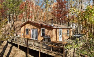 The Dyrt's photo of a cabin at Cozy Cabin w Lake, Hot Tub, Huge Deck & Fire Pit near New Market, VA