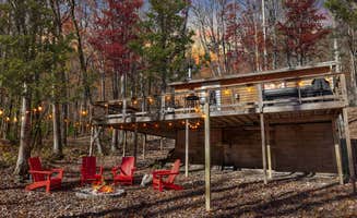 The Dyrt's photo of a cabin at Cozy Cabin w Lake, Hot Tub, Huge Deck & Fire Pit near Burlington, WV