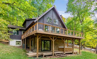 The Dyrt's photo of a cabin at Cozy Cabin w/Fire Pit, Hot Tub, Deck, & Pool Table near Hancock, MD