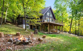 The Dyrt's photo of a cabin at Cozy Cabin w/Fire Pit, Hot Tub, Deck, & Pool Table near Ranson, WV