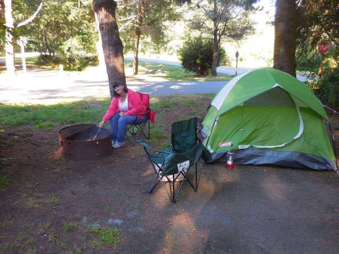 Mom roasting her dog with our cute tent 