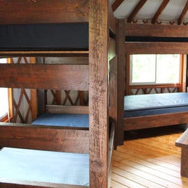 Sets of bunk beds. Each yurt sleeps 7