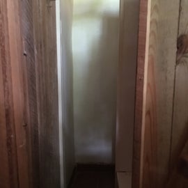Shower stalls with bench area