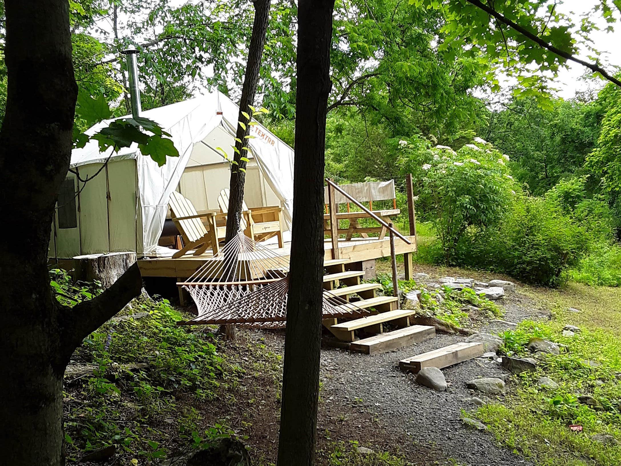 The Dyrt's photo of glamping accommodations at Mill Trail Falls: 2 tent sites available near Kerhonkson, NY