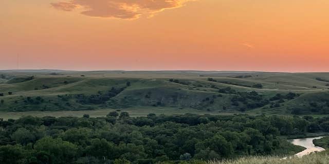 Camper submitted image from River Front RV Parking Camping