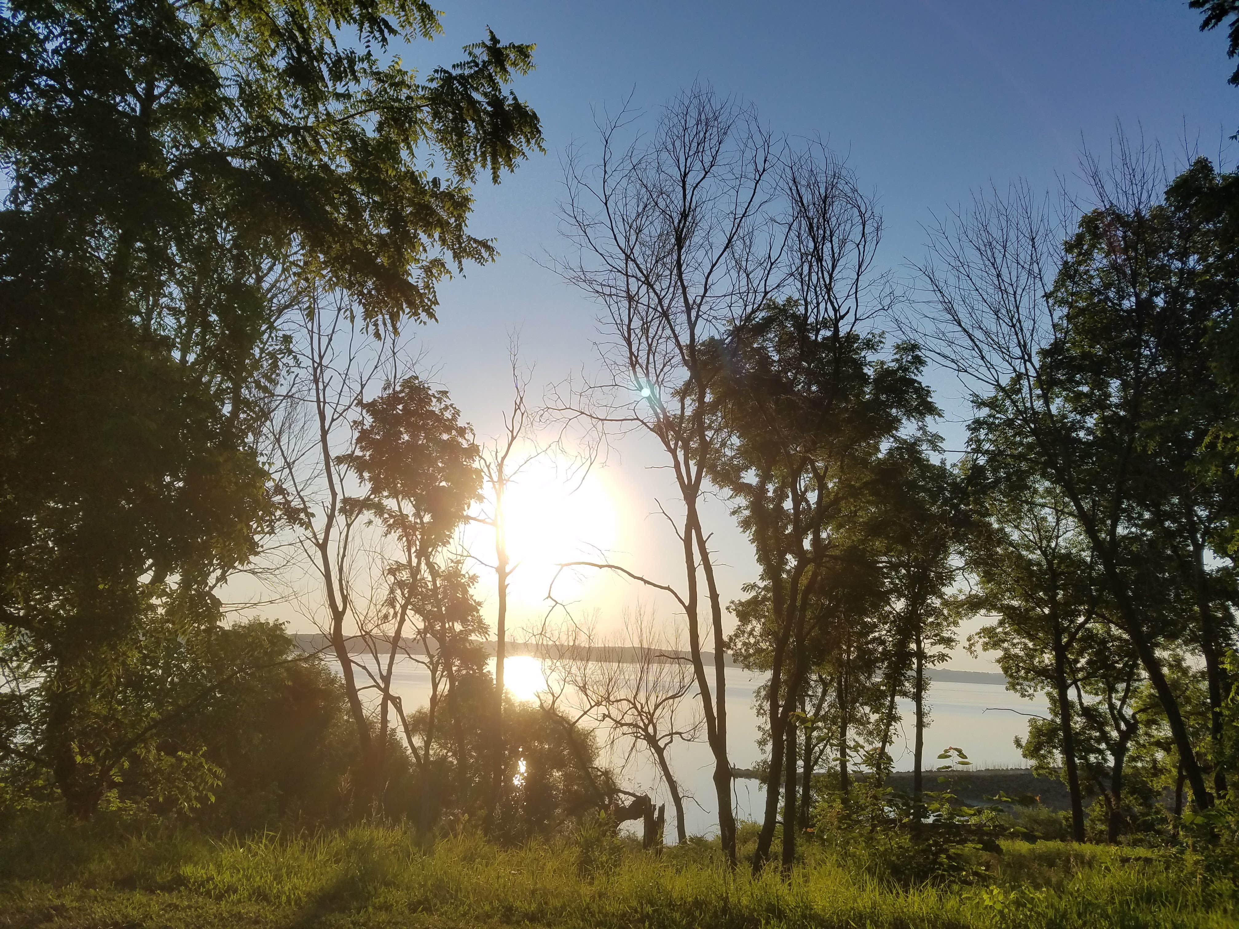 Beautiful sunrise on the lake from the campsite
