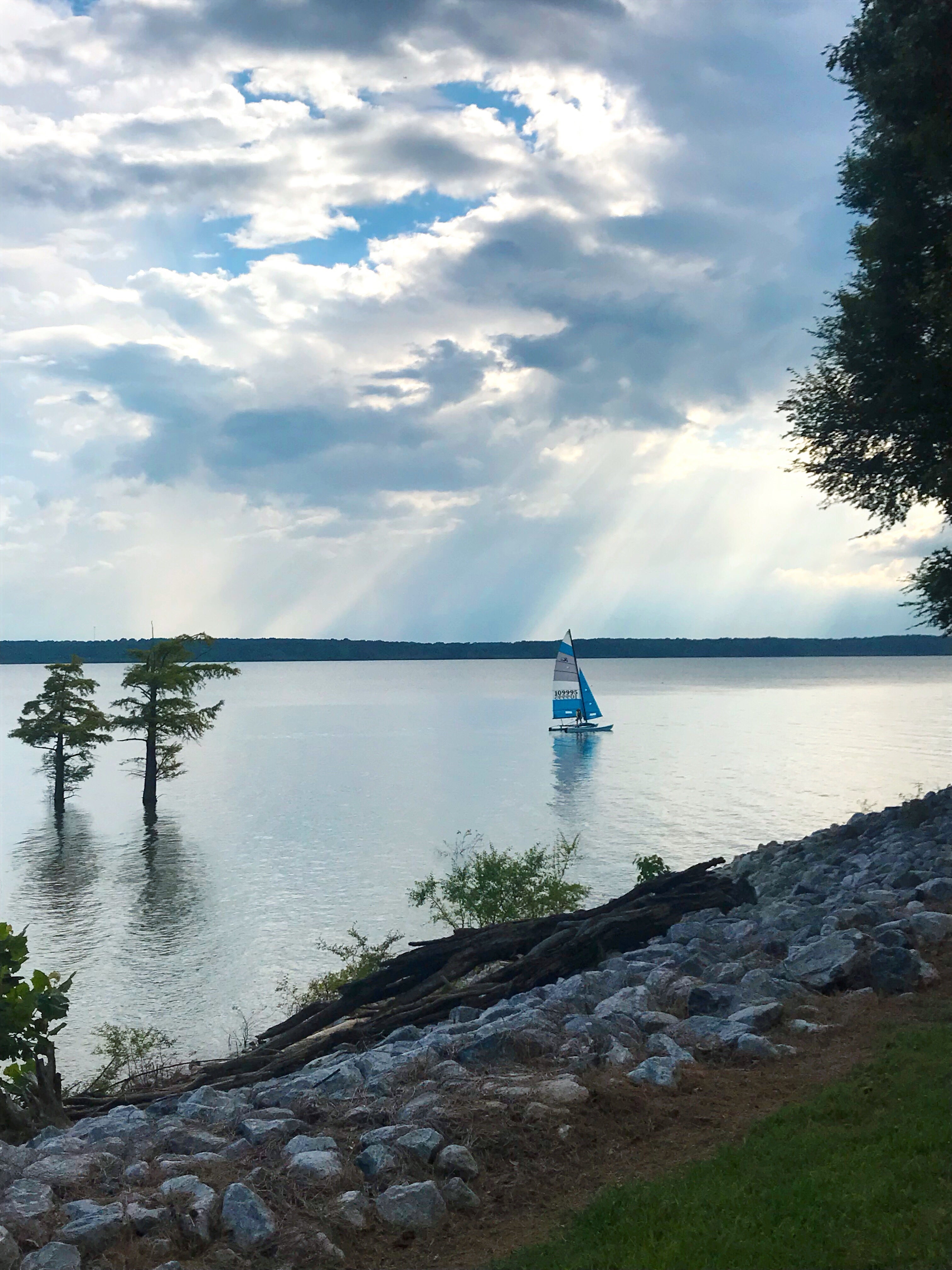 Open view of Lake between sites 19-23. Sailboats are often seen cruising around the lake!