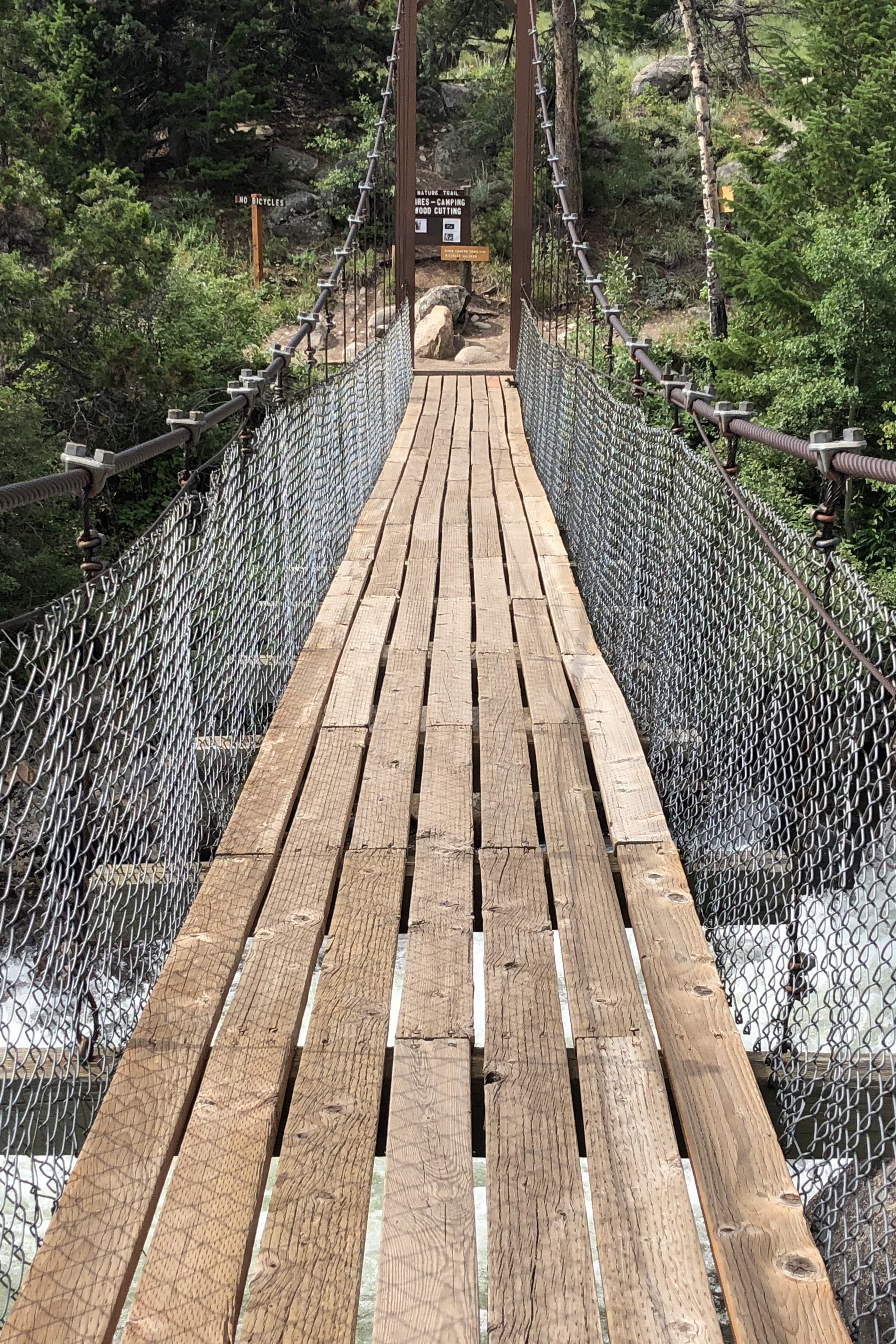 Swinging bridge over the Popo Agie River