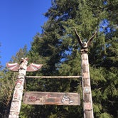 These totem poles are located next to the parking lot at Camp Thundirbird.