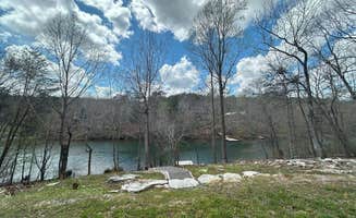 Camp M.'s photo of camping with pets at Lake Lahusage Camper: Dock & Kayaks near Rising Fawn, GA