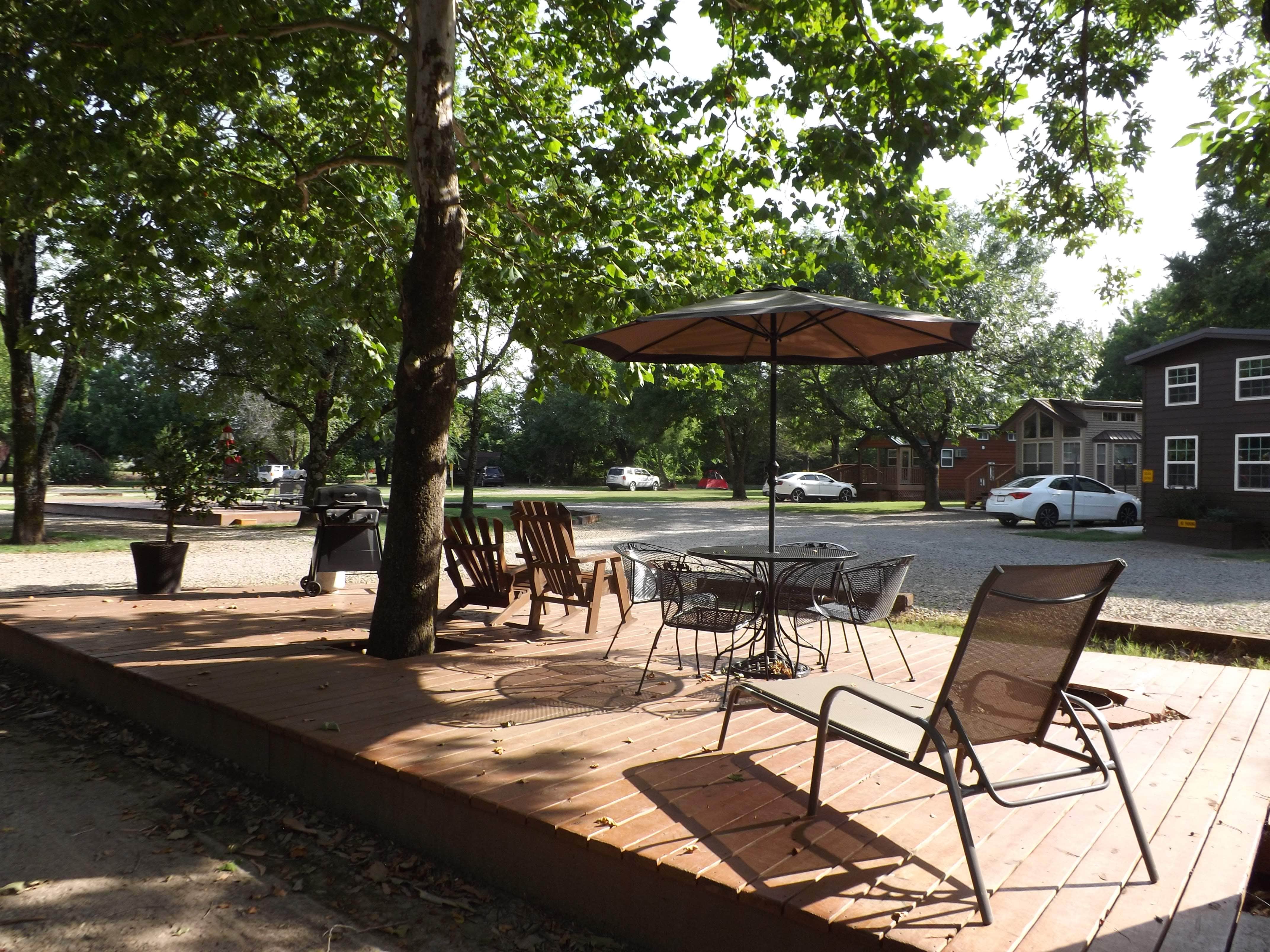 One of our deluxe patio sites to park your travelling home in front of!