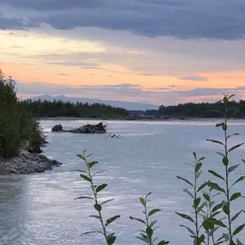 Gorgeous sunset on the river! Check out Susitna mou train also know as the Sleeping Lady.