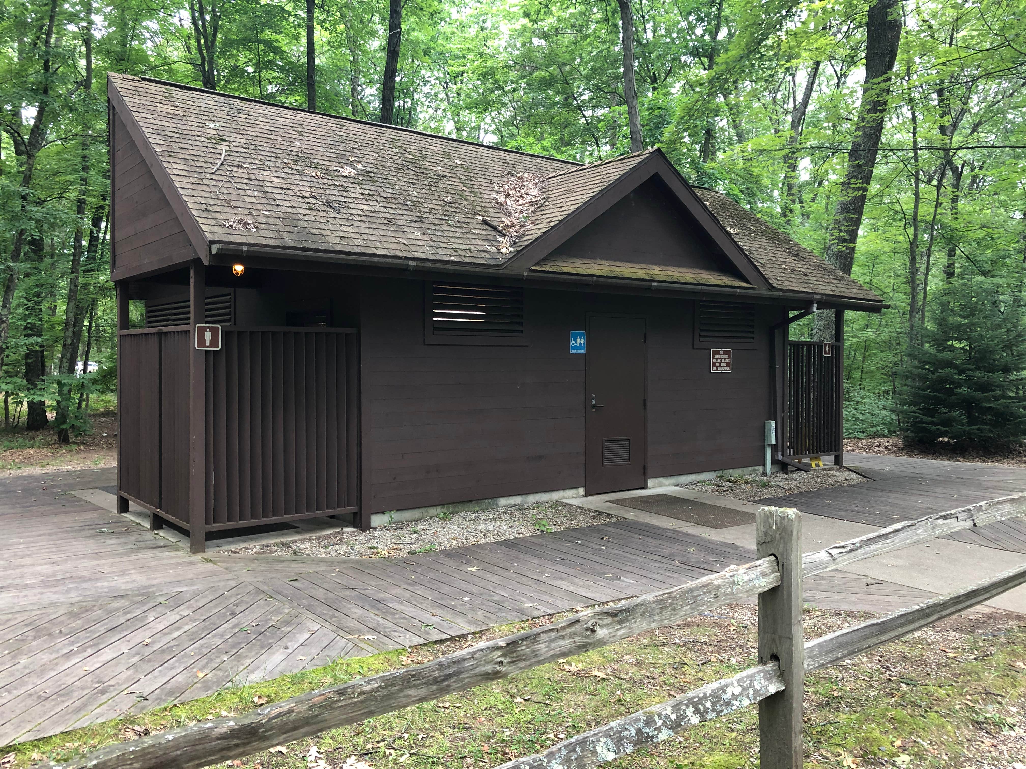 A shower and flush toilets at a rustic campground!