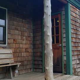 Front of the hut. There are north and south bunkrooms on either side of a central dining room.