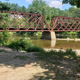 The railroad bridge marks the edge of the campground