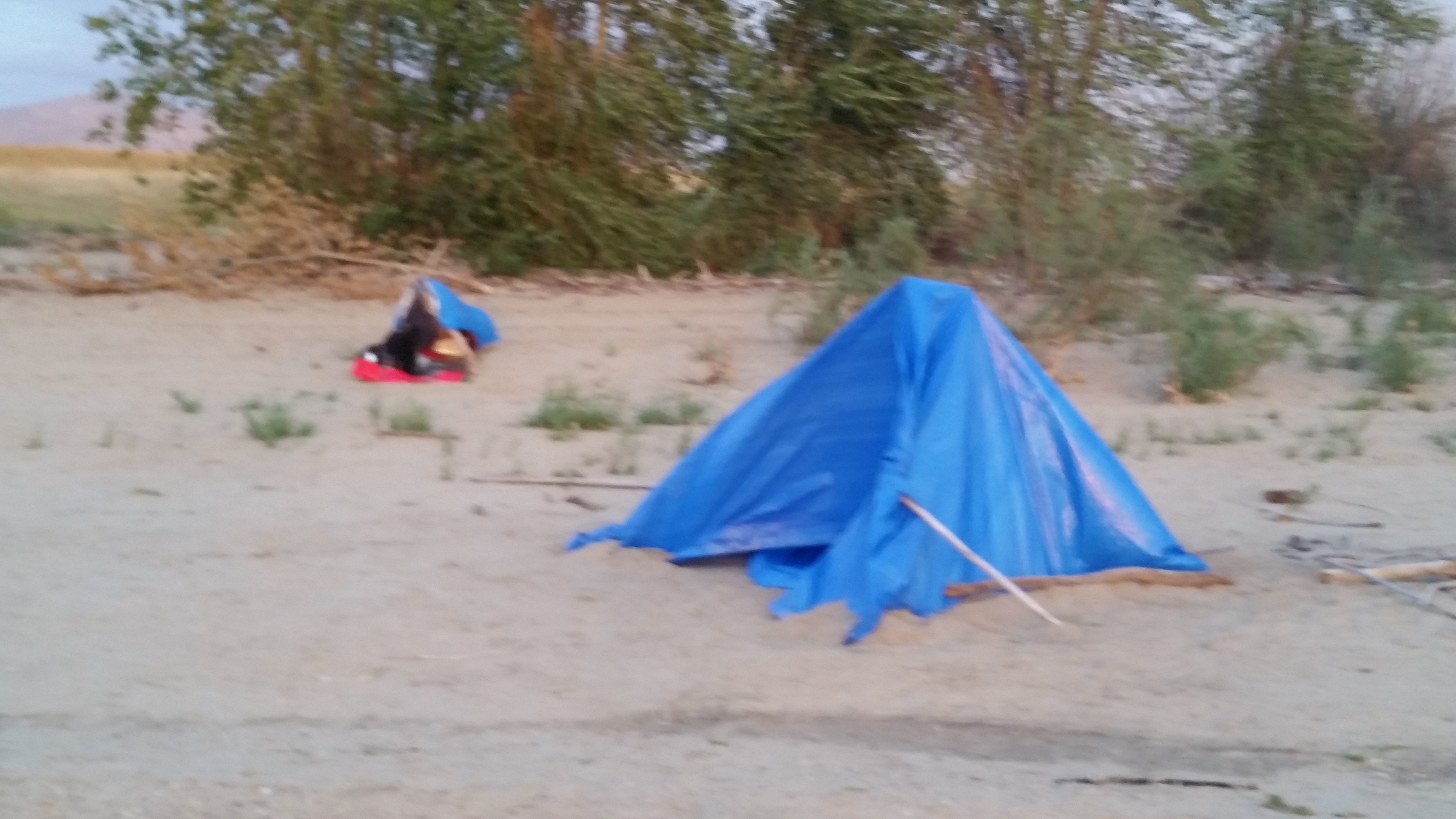 camping on the beach in our emergency shelters
