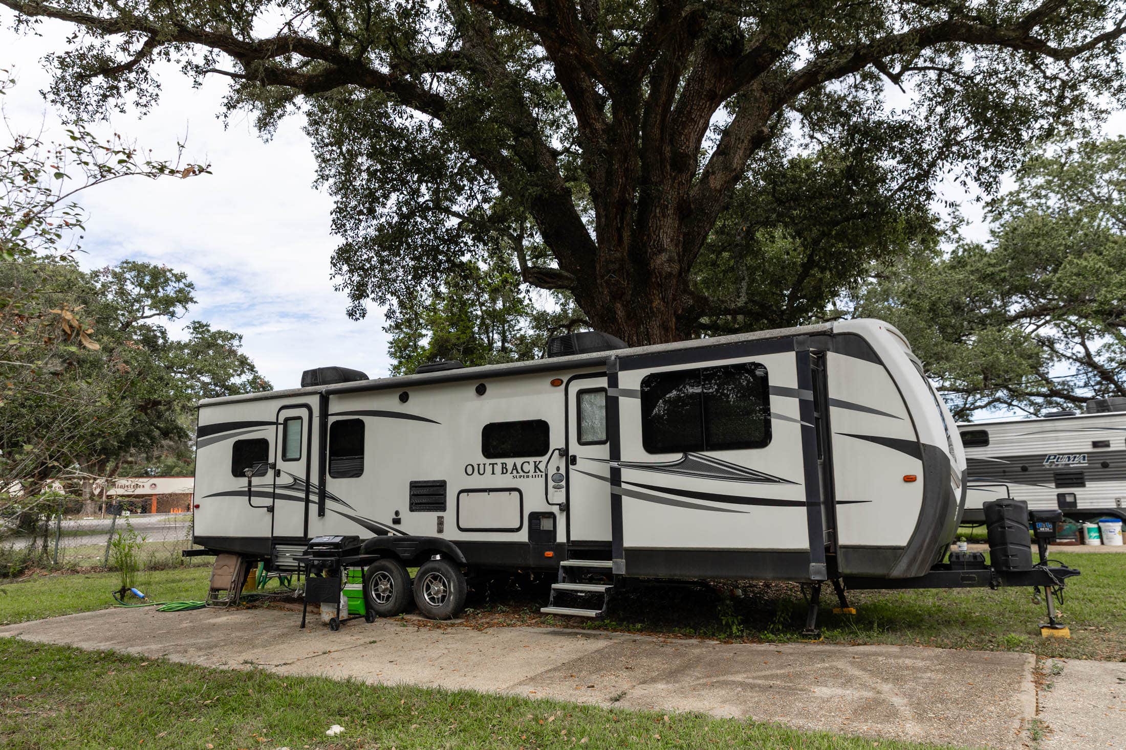 Camping near Zen Rustic Tiny Cabin - PERMANENTLY CLOSED: Tanglewood Gardens Mobile Home and RV Park, Pensacola, Florida
