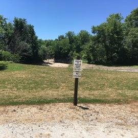 This is Site I parking area looking the other direction.  There is a boat ramp here also, and in the back ground you can see a sand bar on the Chariton River.  Tent camping is allowed on the grassy area.