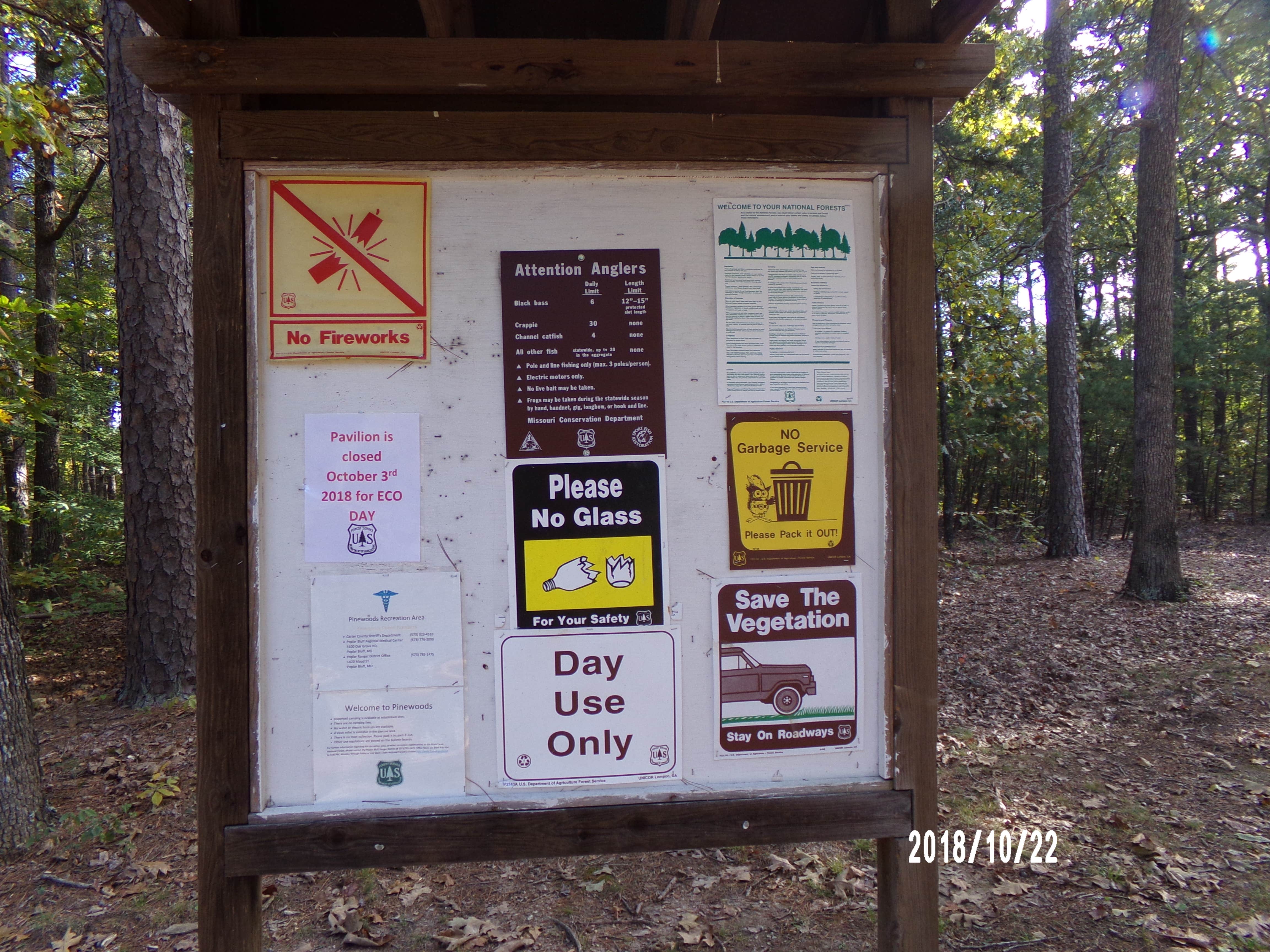 Picnic area sign, camping in campground only in same park.