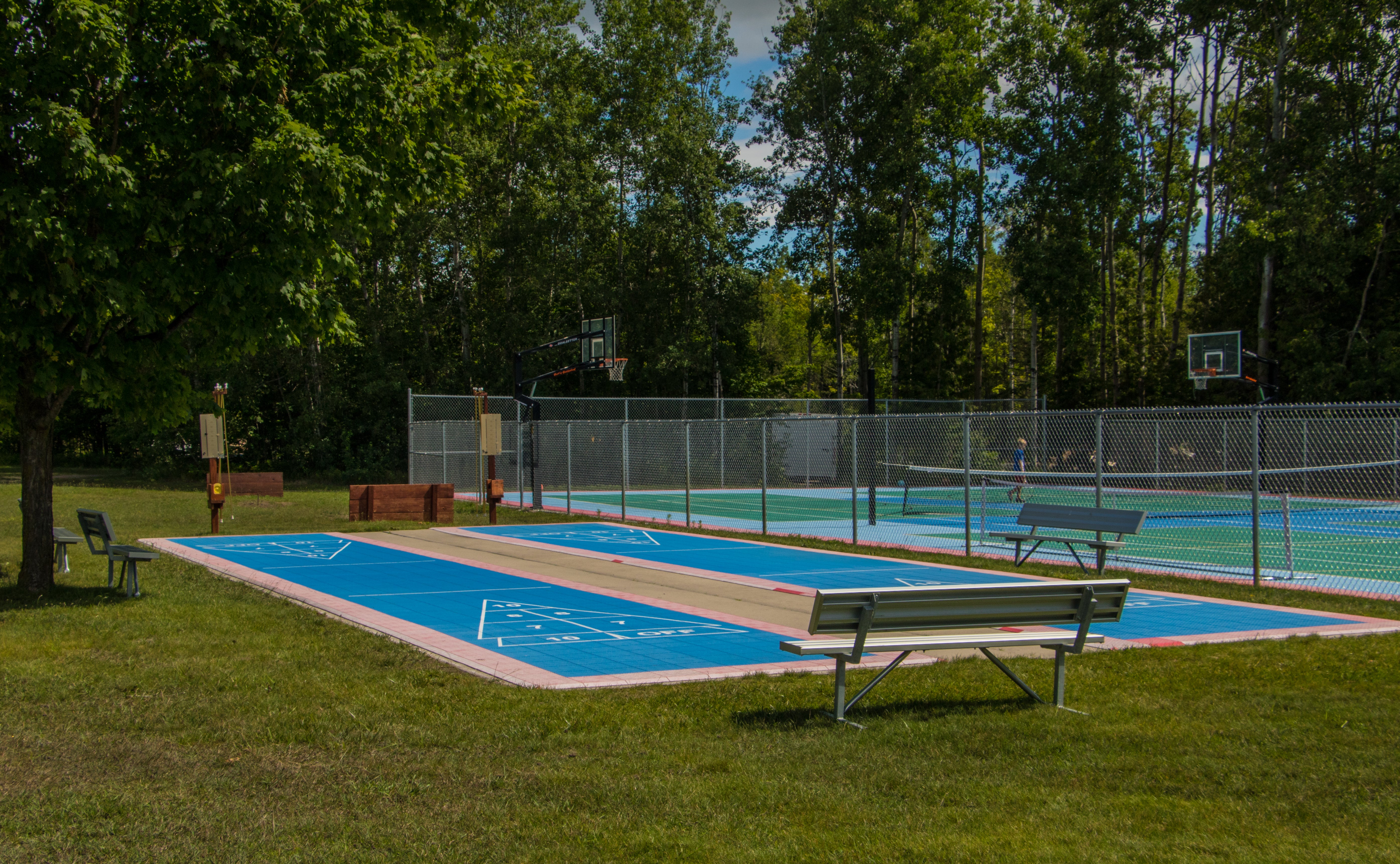 Tennis anyone?  Or, volleyball, basketball, shuffle board, or horseshoes?  All of these activities are located behind the campground office.