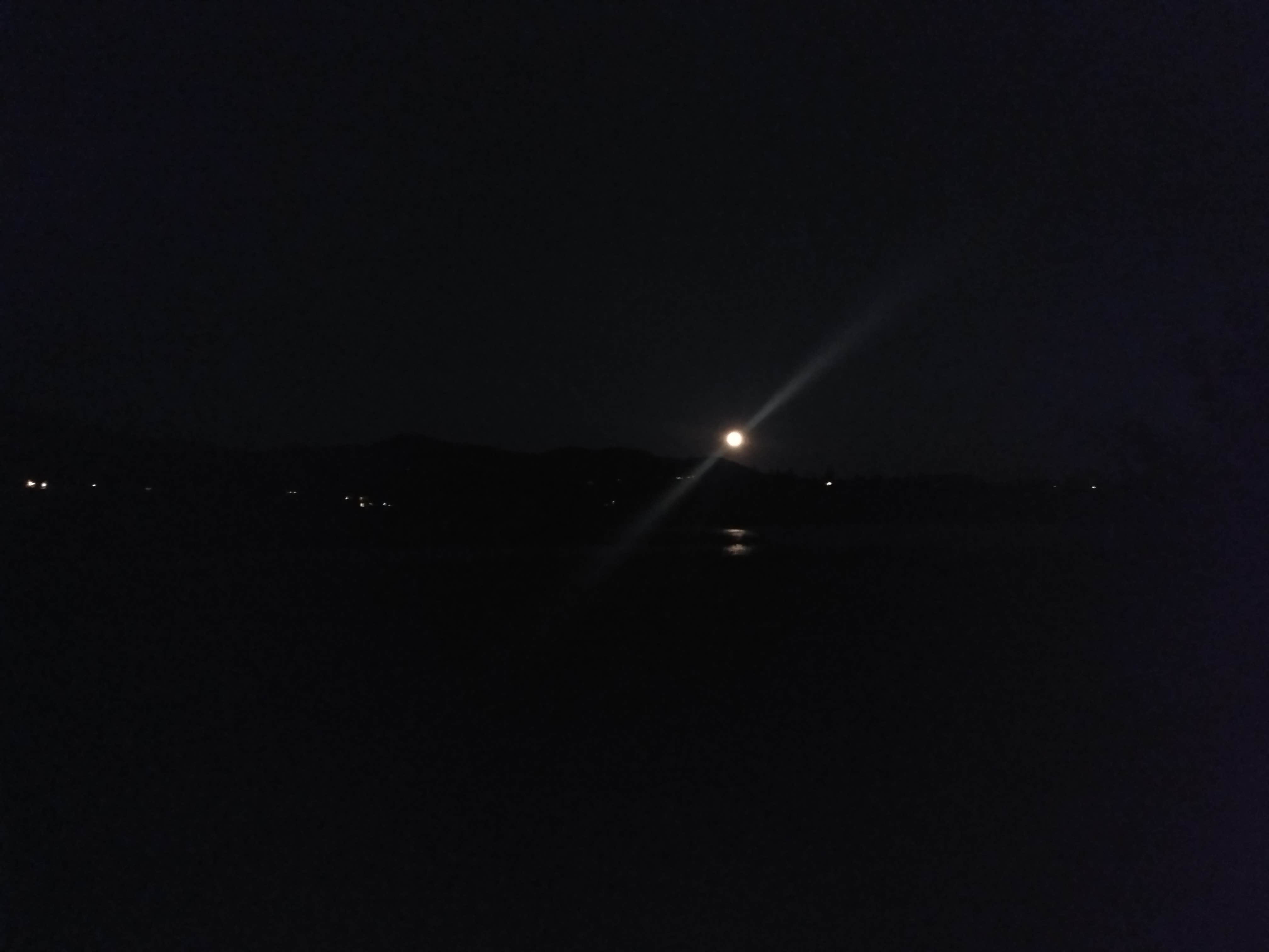 Trying to capture the moon over water.
