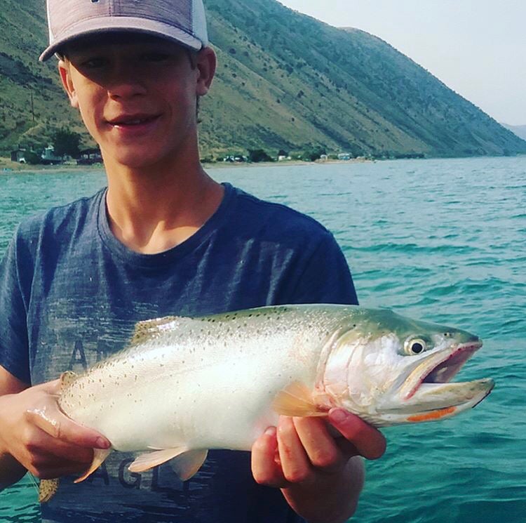A nice cutthroat trout on Bear Lake ( that's my handsome son!) 