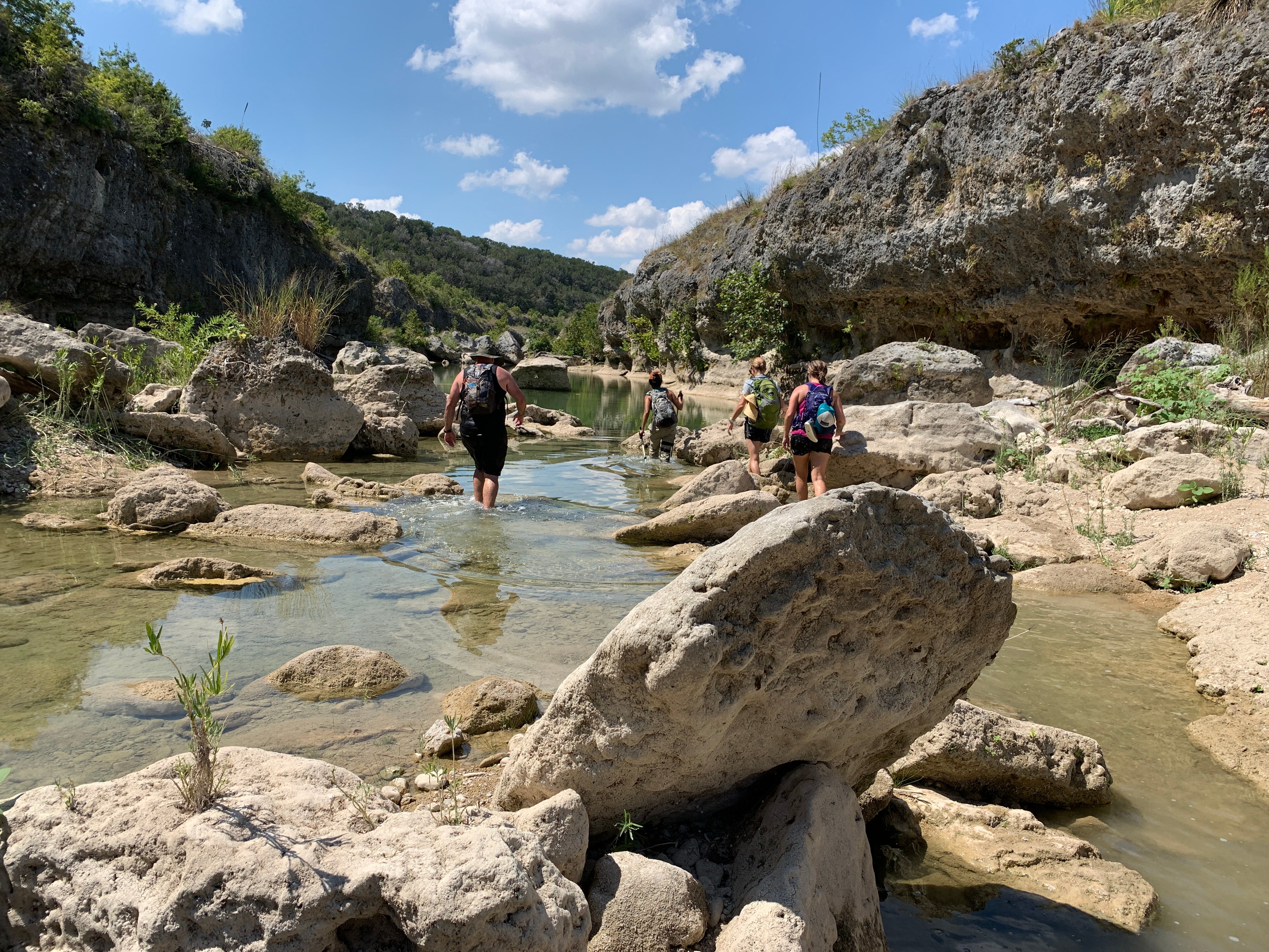 Hiking and playing in the Blanco River