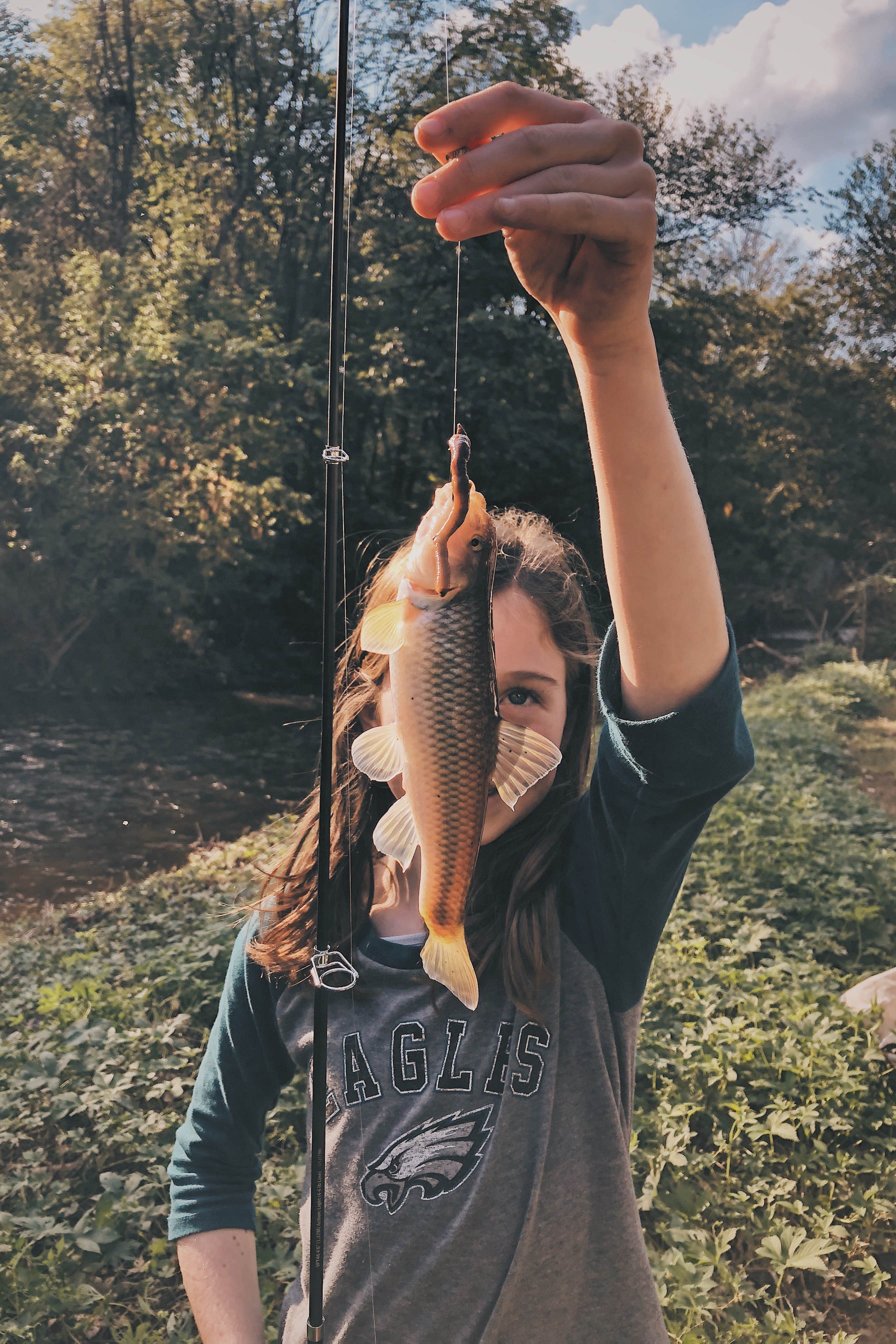 Her first trout (Go Birds!)