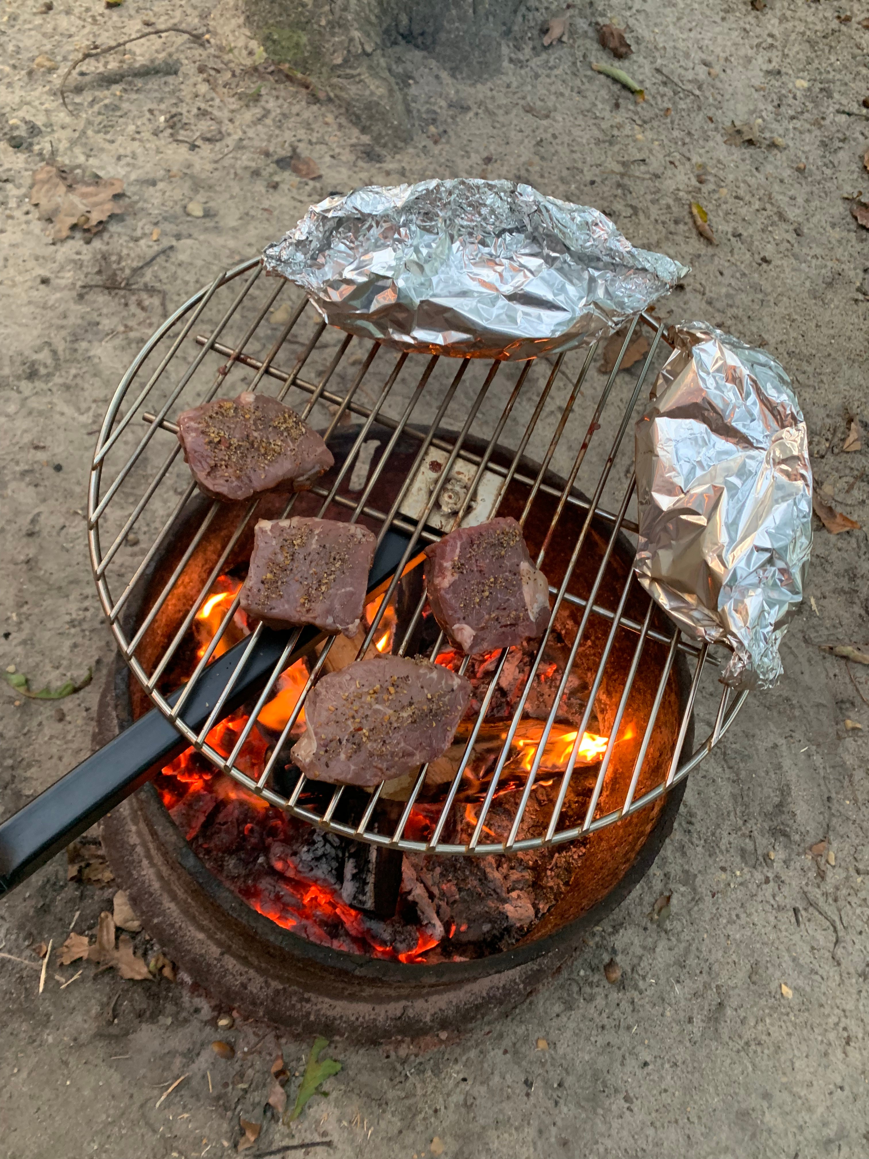 MMMM!!!  Steak over a wood fire!!  Delicious!!