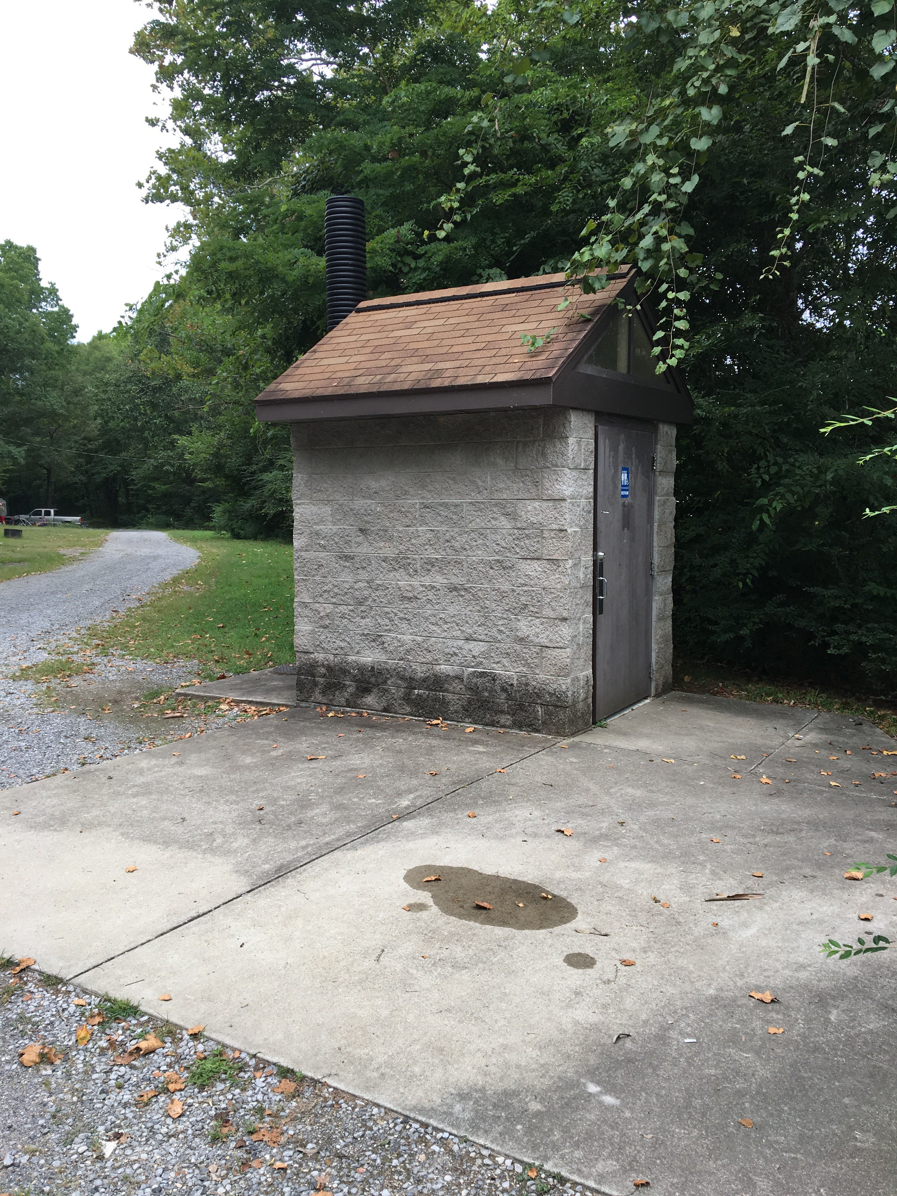The pit toilet near the pavilion and campground